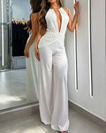 Gold Chain Backless Deep V-Neck Pleated Waist Wide Leg Flared Jumpsuit
