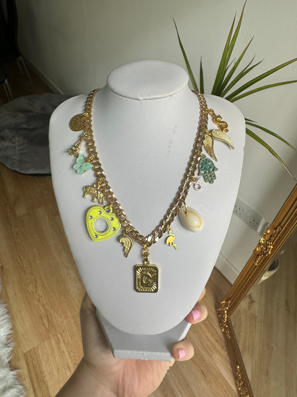 Gold multi charm letter necklace