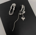 Asymmetrical earrings