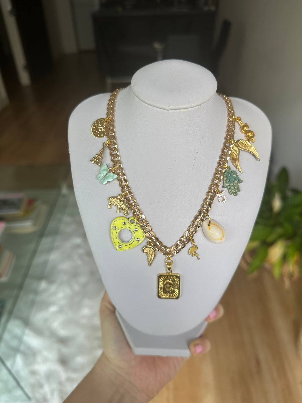 Gold multi charm letter necklace