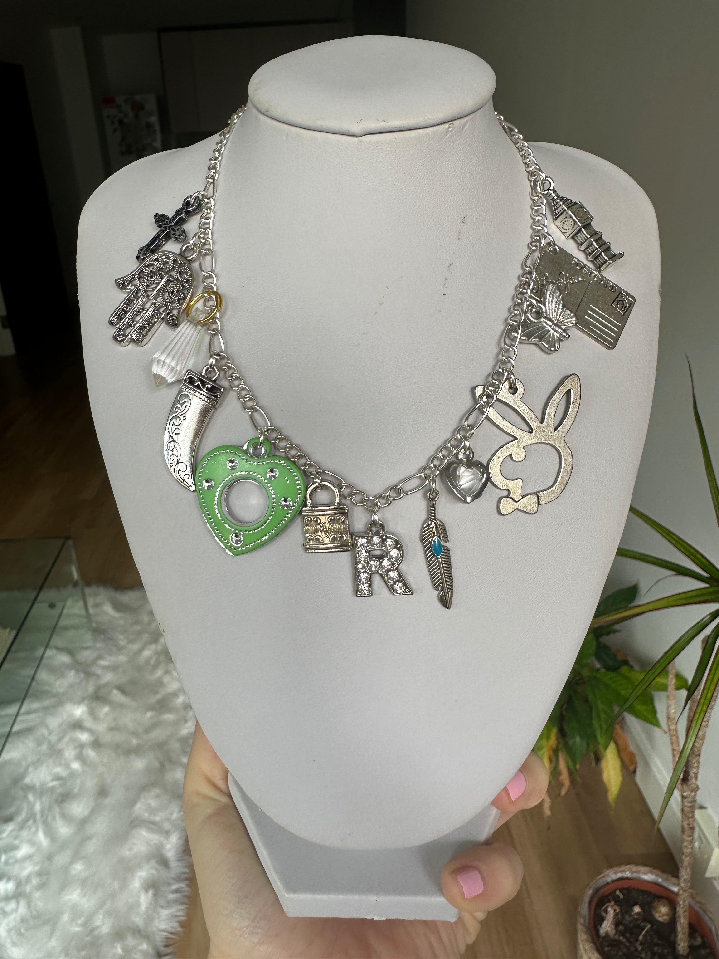 Silver multi charm necklace