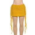 Tassel Mini Skirt & Knit Crochet Top Yellow