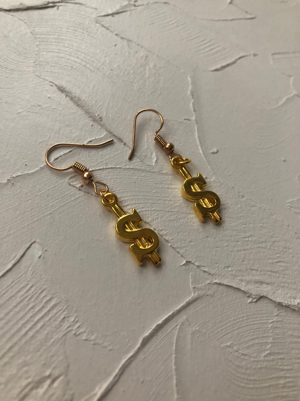 Mini dollar sign earrings
