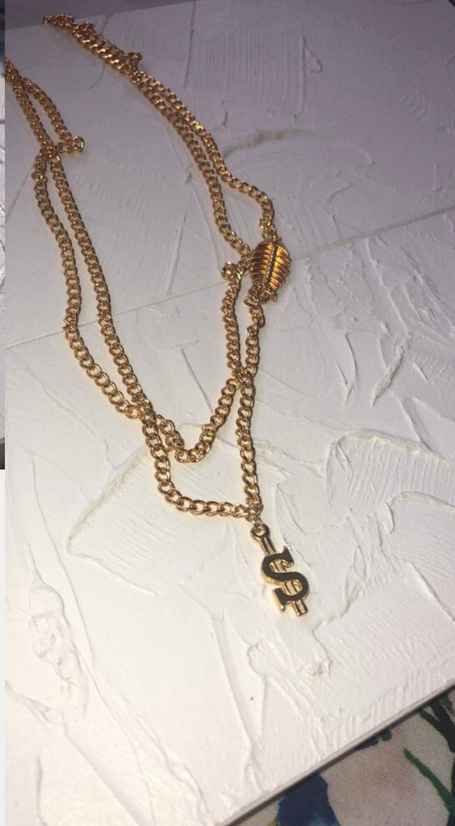 Dollar sign necklace