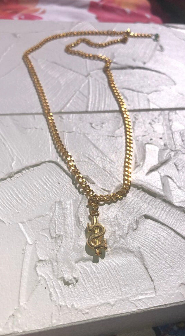 Dollar sign necklace