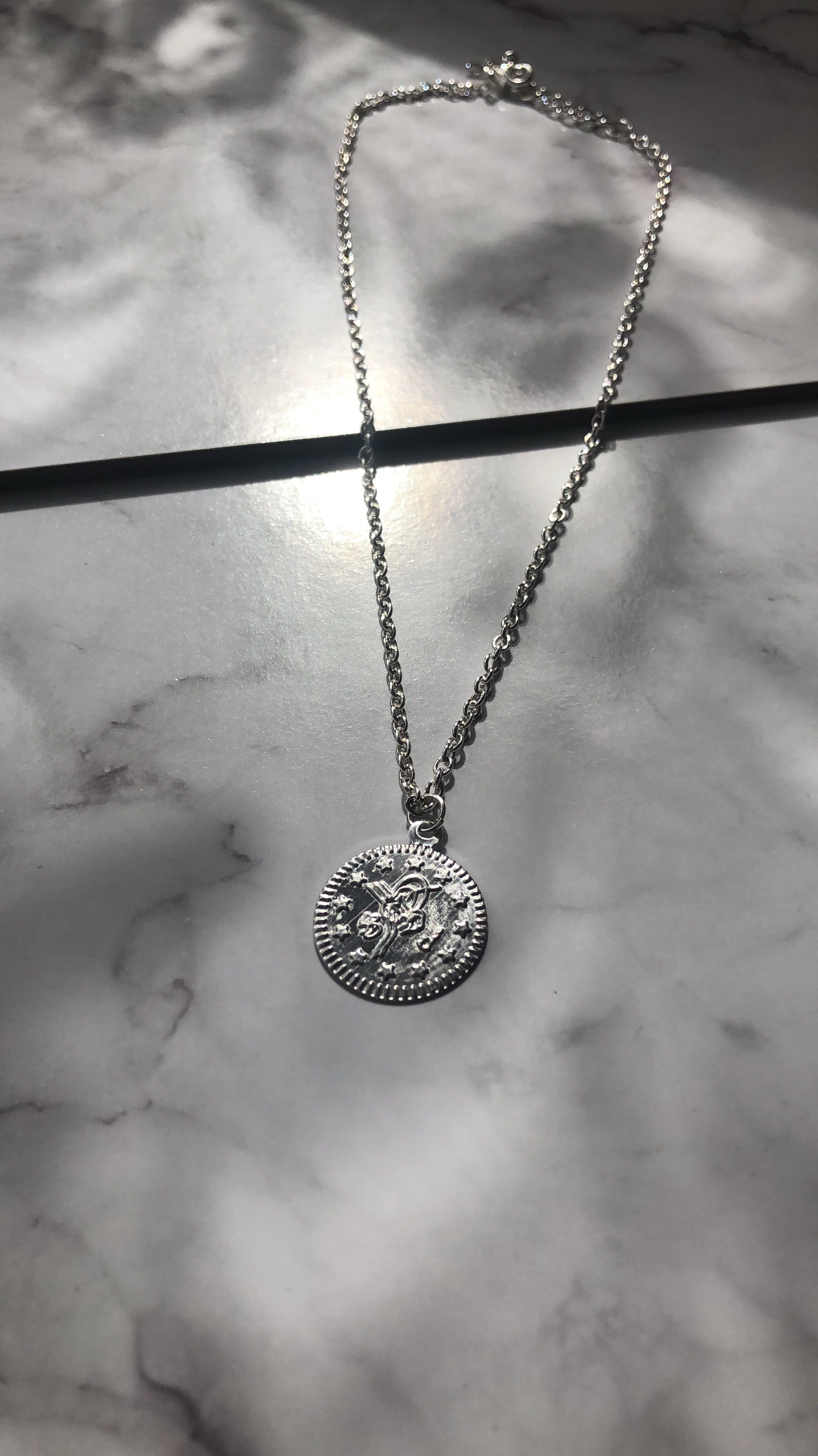 Coin pendant chain